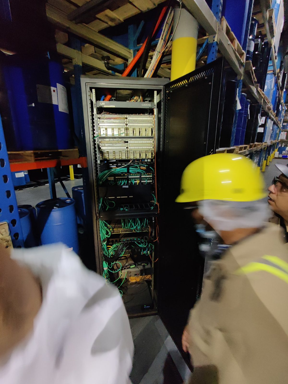 Network cabinet installed in a warehouse